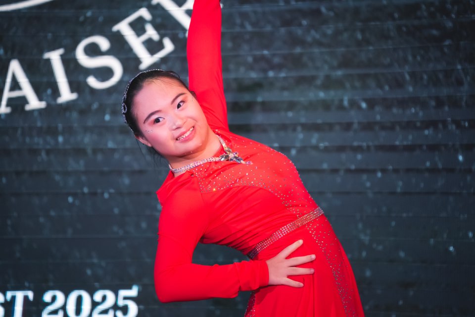 Megan Tang in a dance pose at a Community Chest gala
